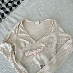 Altar’d state Elegant Cream Ribbed V-Neck Top